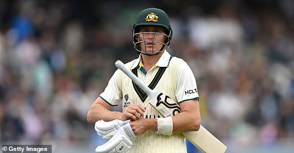 LONDON, ENGLAND - JUNE 11: Marnus Labuschagne   of Australia leaves the field after being dismissed by Marco Jansen of South Africa during day one of the ICC World Test Championship Final between South Africa and Australia at Lord's Cricket Ground on June 11, 2025 in London, England.  (Photo by Gareth Copley/Getty Images)