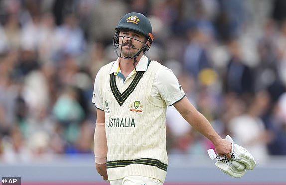Australia's Travis Head walks off the field after losing his wicket during the World Test Championship final between South Africa and Australia at Lord's cricket ground in London, Wednesday, June 11, 2025. (AP Photo/Kirsty Wigglesworth)