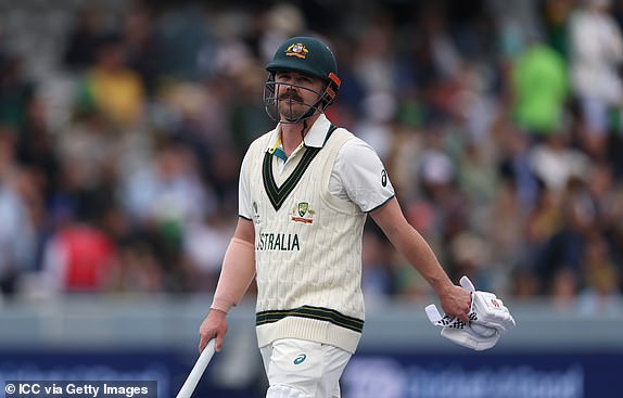 LONDON, ENGLAND - JUNE 11: Travis Head of Australia walks off after being dismissed during Day One of the ICC World Test Championship Final 2025 between South Africa and Australia at Lord's Cricket Ground on June 11, 2025 in London, England.  (Photo by Alex Davidson-ICC/ICC via Getty Images)