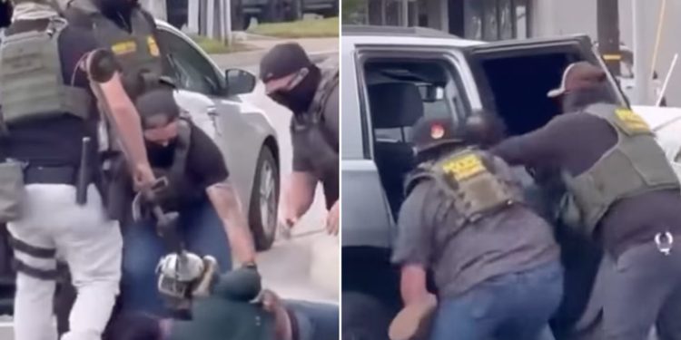 Čini se da šokantni video prikazuje oca trojice američkih marinaca koje su na parkiralištu pretukli maskirani agenti