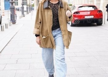 Emma Watson izgleda bez napora šik u crnom mrežicu i svijetloplavim trapericama dok izlazi u Parizu