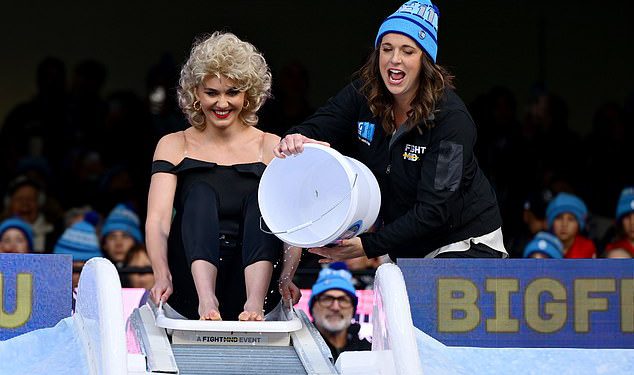 Zlatna djevojka Ariarne Titmus krade emisiju u AFL Big Freezeu dok se na MCG -u poštuje MCG, u čast MND Battler Neale Daniher