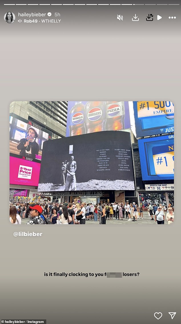 Činilo se da je Hailey ciljao na 'gubitnike' koji su nagađali o svom braku dok je ponovno objavila fotografiju Justinovog masivnog panoa na NYC-ovom Times Squareu ranije ovog mjeseca