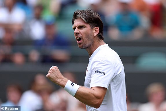 TENNIS - WIMBLEDON - All England Lawn Tenis and Croquet Club, London, Britanija - 2. srpnja, 2025. Britanija Cameron Norrie reagira tijekom svog drugog kruga protiv Frances Tiafoe iz SAD -a Reuters/Toby Melville