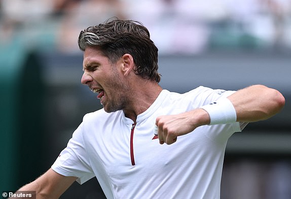 TENNIS - WIMBLEDON - All England Lawn Tenis and Croquet Club, London, Britanija - 2. srpnja, 2025. Britanija Cameron Norrie reagira tijekom svog drugog kruga protiv Frances Tiafoe iz SAD -a Reuters/Toby Melville