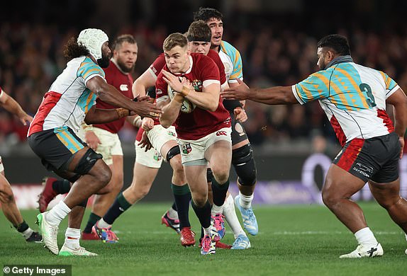 MELBOURNE, AUSTRALIA - JULY 22:  Garry Ringrose of the British & Irish Lions charges upfield during the First Nations & Pasifika v the Bristish & Irish Lions match held at the Marvel Stadium on July 22, 2025 in Melbourne, Australia.  (Photo by David Rogers/Getty Images)