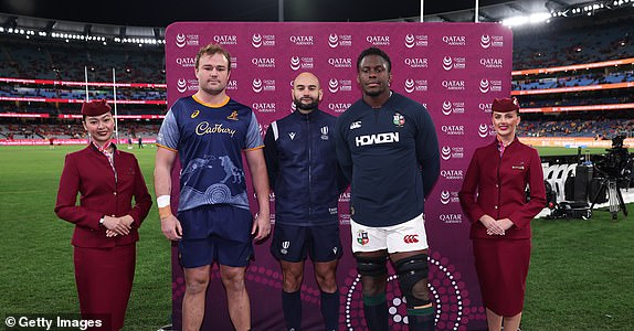 MELBOURNE, AUSTRALIA - JULY 26: Harry Wilson of the Wallabies and Maro Itoje of the British & Irish Lions pose with referee Andrea Piardi prior to the coin toss during the second test of the series between Australia Wallabies and British & Irish Lions at the Melbourne Cricket Ground on July 26, 2025 in Melbourne, Australia. (Photo by Cameron Spencer/Getty Images)