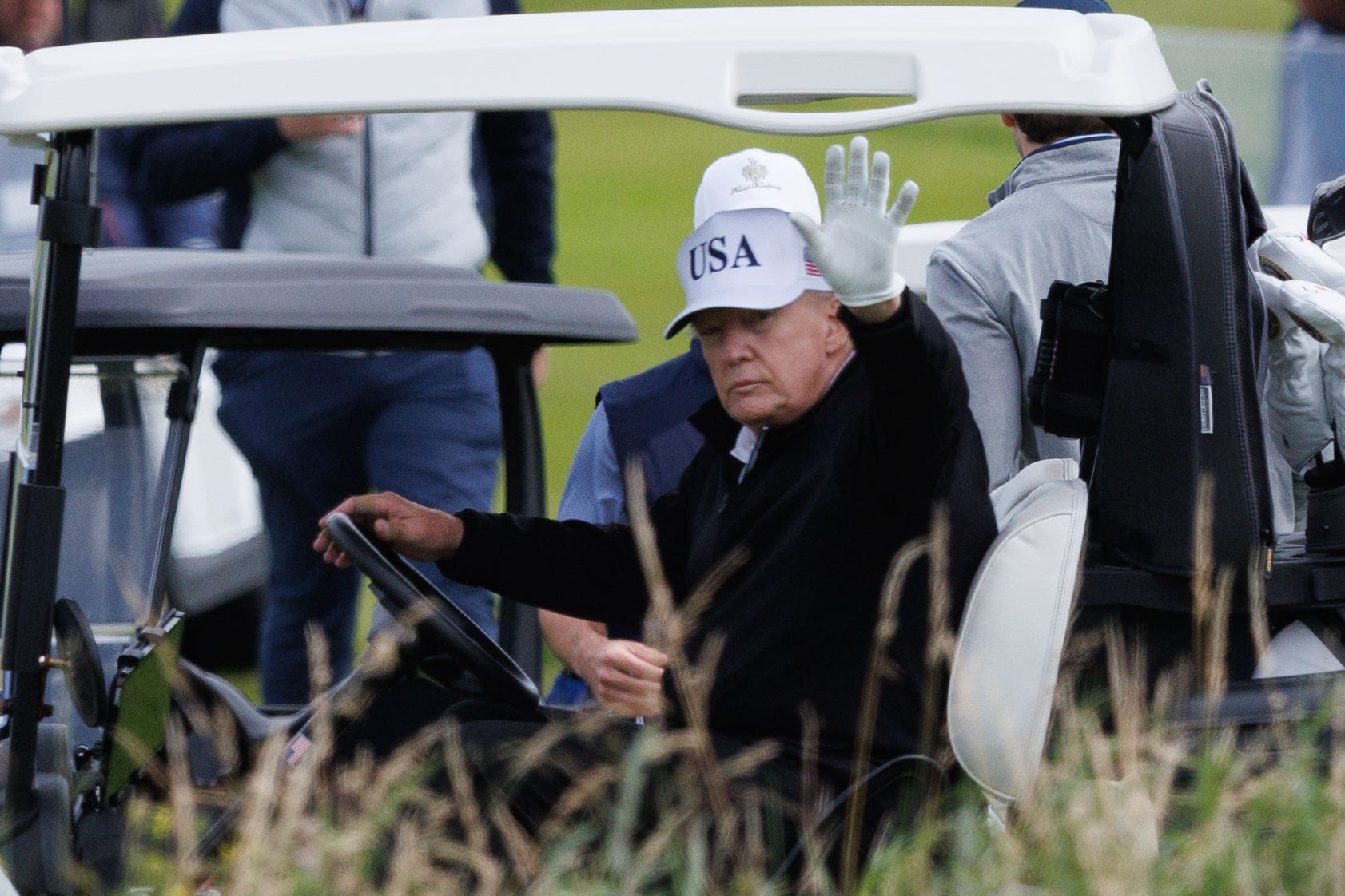 Činilo se da je Trump izdvojio trenutak iz svog golfskog putovanja u Škotskoj kako bi razgovarao s vođama Kambodže i Tajlanda