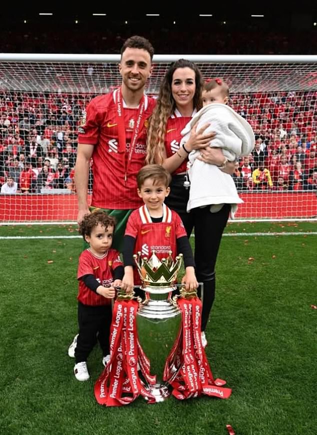 The couple have three children, pictured on the Anfield pitch in May after winning the Premier League