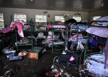 Teksaški dužnosnici dovode u pitanje prognoze poplave u skaliranom leđa – ali stručnjaci kažu da je agencija učinila sve što je moglo