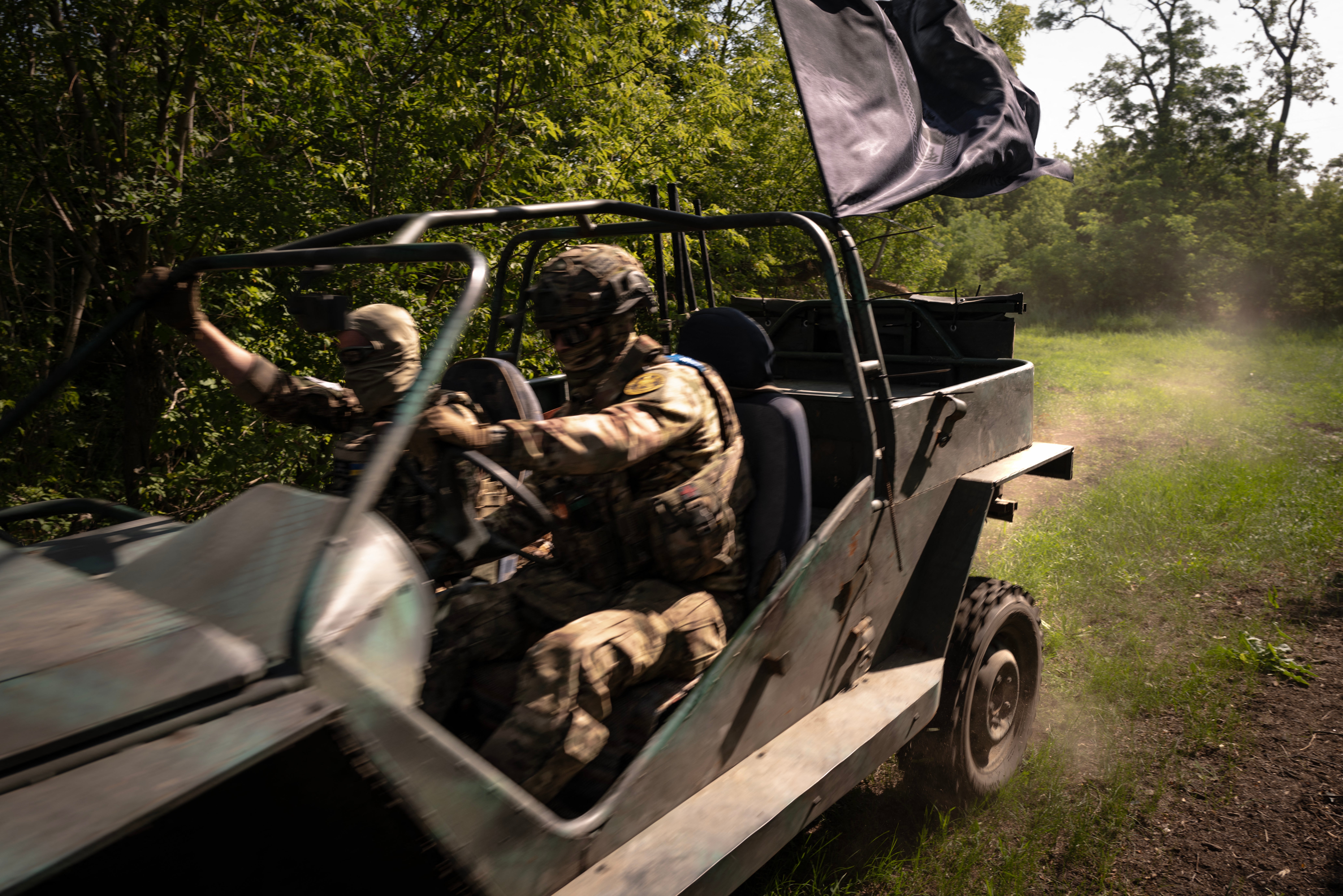 Soldiers from the 3rd operation Spartan brigade of the national guard of Ukraine drive a buggy during a demonstration to AFP, at an undisclosed location, in the region of Dnipropetrovsk, Ukraine, on 14 June 2025