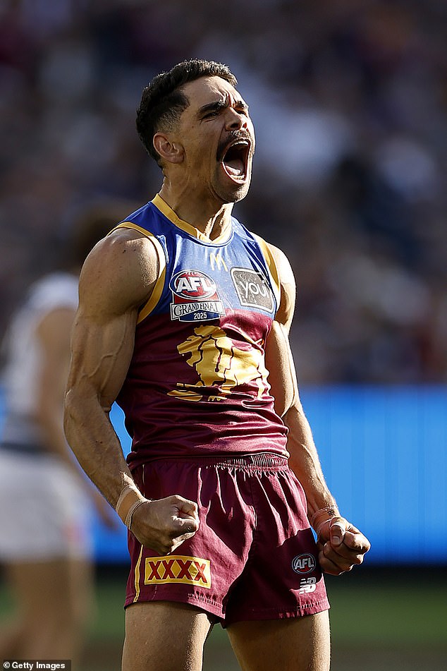 Charlie Cameron roars his approval as he kicks four goals to blow the game wide open