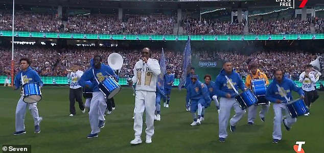Snoop Dogg leaves fans X as he takes to the stage at the MCG with X AFL Grand Final pre-game performance