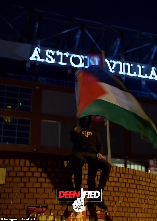 One of the protesters can be seen sitting on the exterior wall of the stadium waving a Palestinian flag, as just metres away - through the bars of the railings - an Aston Villa security guard can be seen walking around the pitch