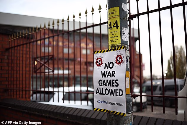 The enlarged police presence in the UK's second city arrived just hours after g angs of masked Muslim protesters posted 'Zionists not welcome' signs around the streets of Birmingham