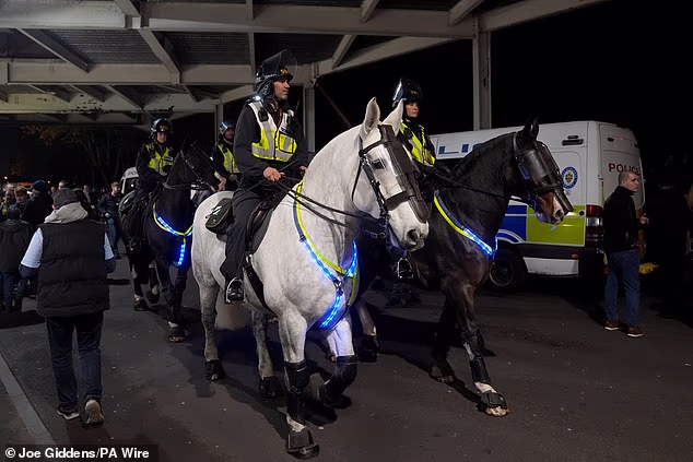 Police ride in on horses as fears over potential violence ahead of the Aston Villa fixture led hundreds of officers to the scene