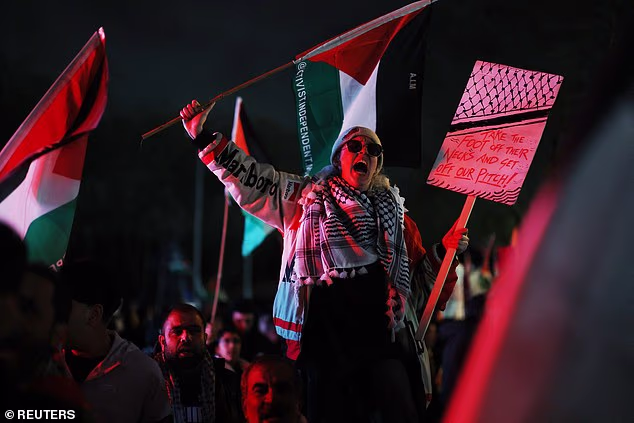 Such is the fear of heightened tensions between Palestinian supporters, pictured, and pro-Israeli campaigners that nearby schools closed early on Thursday