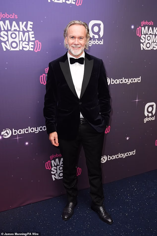 Kuhar Marcus Wareing nosio je elegantno crno odijelo