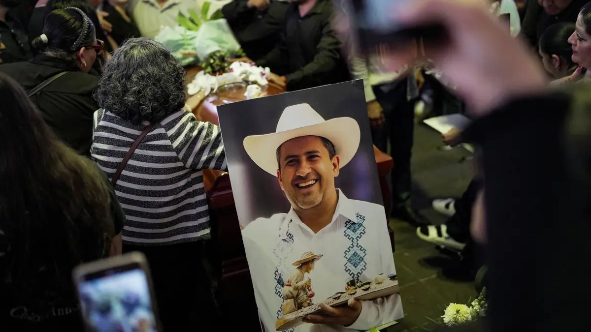 Pogreb Carlosa Manza