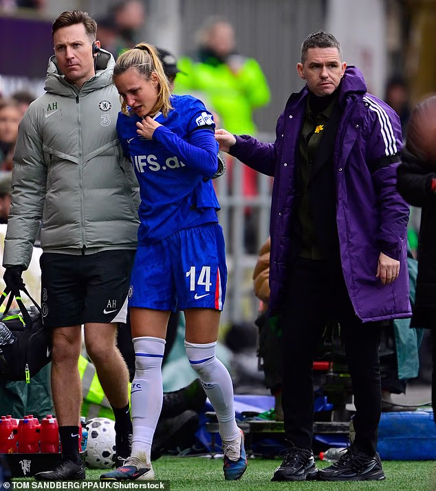 Marc Skinner checks on Chelsea's Nathalie Bjorn as she goes off injured during the League Cup final on Sunday. Skinner denies there were any attempts at intimidation from his staff towards the Chelsea players