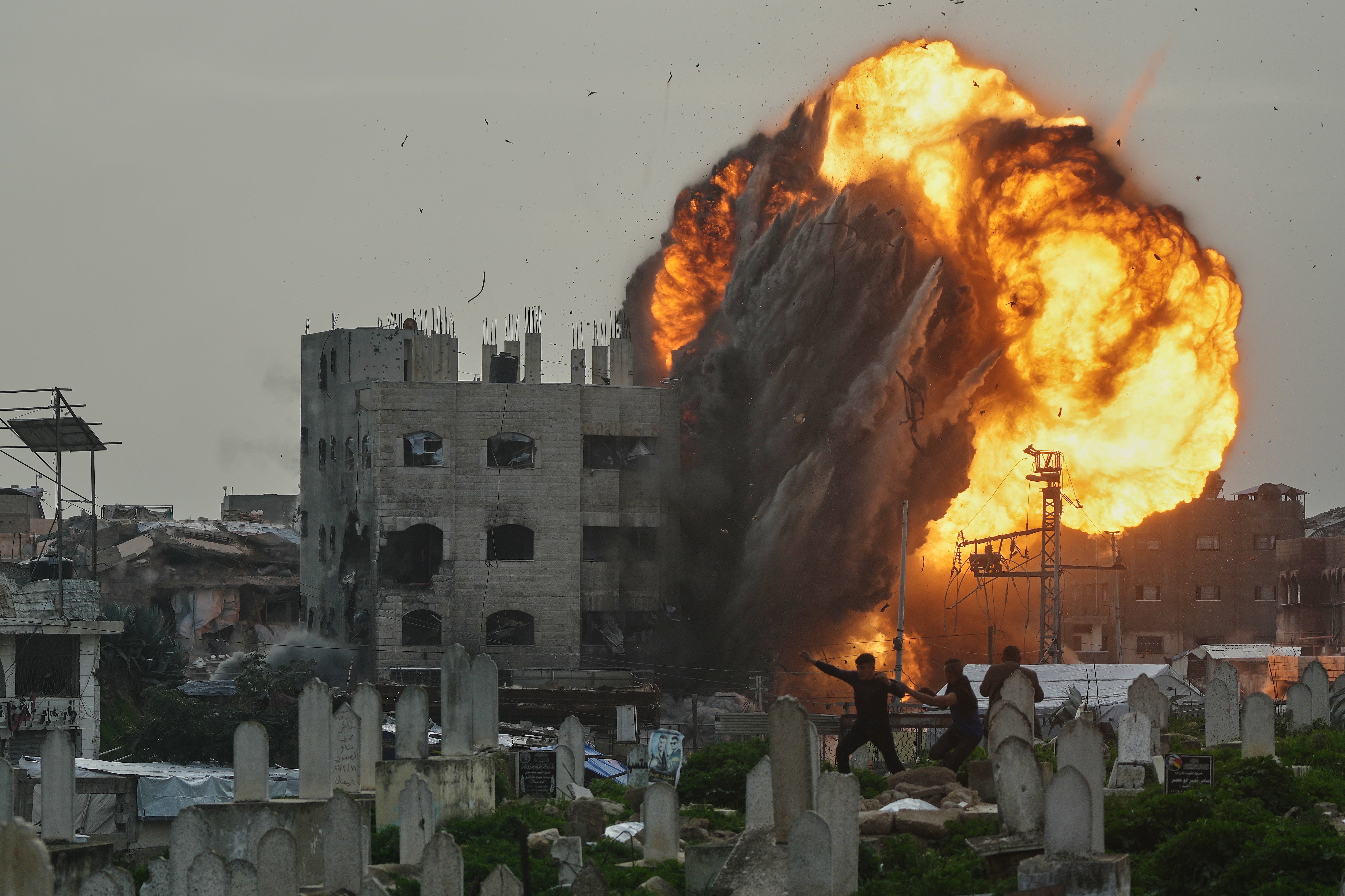 Smoke and flames rise from an Israeli military strike on a building in the Zeitoun neighborhood of Gaza City, Friday, Feb. 6, 2026.