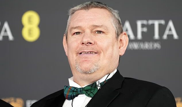 Tourettov aktivist John Davidson žrtva je provale nakon što su lopovi napali njegov dom u Škotskoj dok je bio na dodjeli BAFTA-e u Londonu – dok skandal s N-riječi tutnji