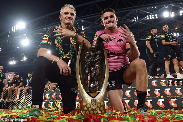 Ivan Cleary (na slici s Nathanom nakon velikog finala 2024.) već je iskazao interes za treniranje reprezentativne momčadi