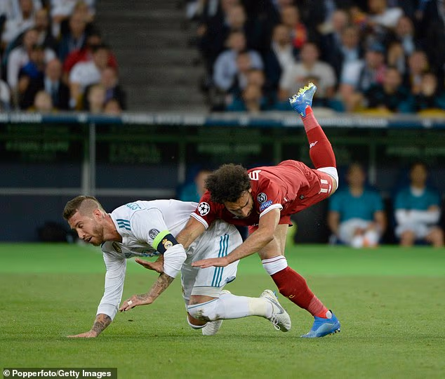 Sergio Ramos drags Salah to the floor in the 2018 Champions League final, straining the Egyptian's shoulder ligaments