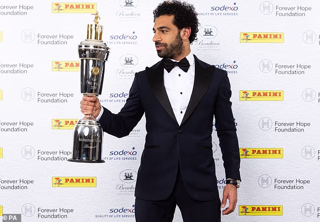 But his first season on Merseyside was undeniably a success, winning the Premier League Golden Boot, PFA Player of the Year (pictured) and FWA Player of the Year