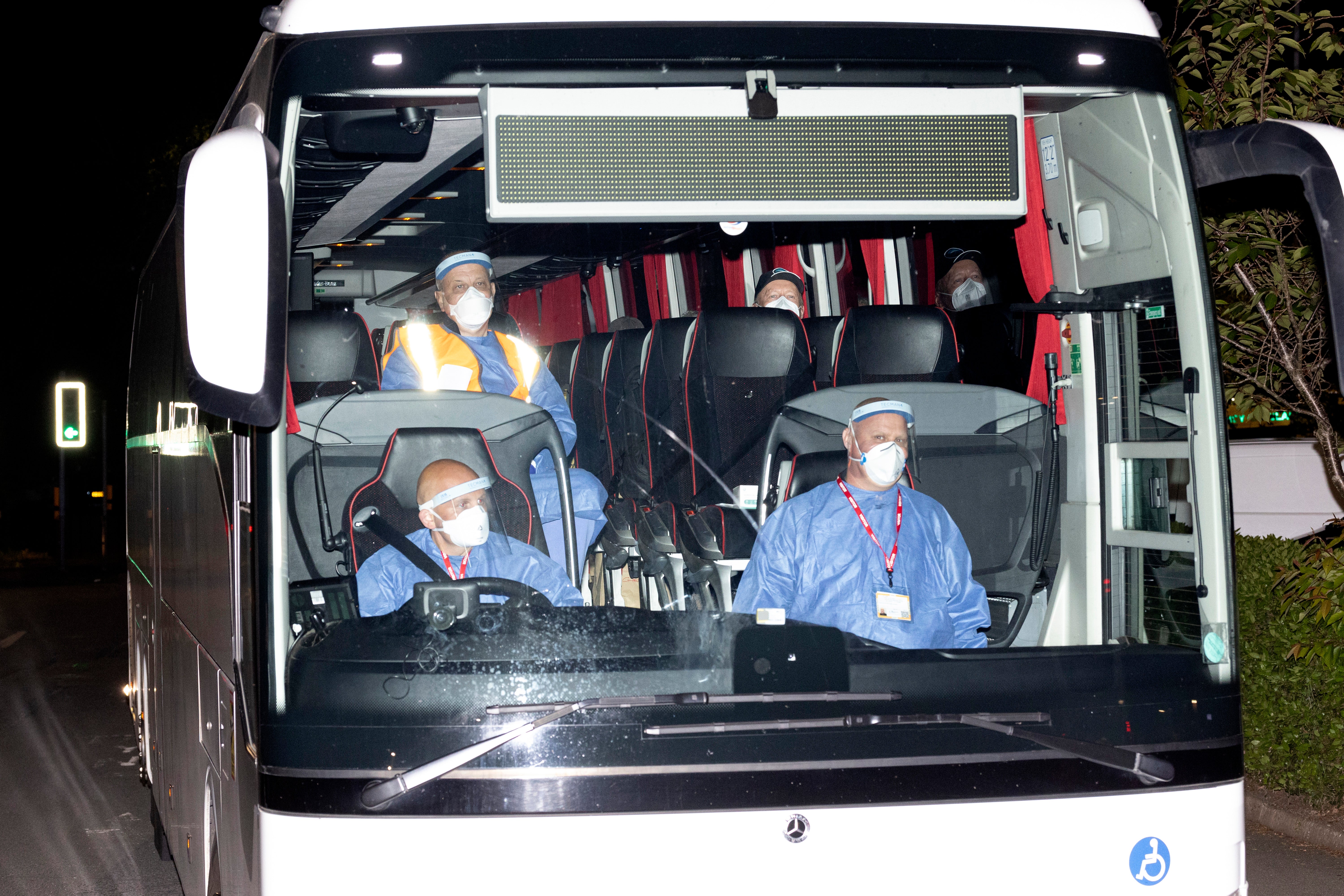 The bus carrying the British passengers and crew being repatriated from the MV Hondius makes its way to Arrowe Park Hospital
