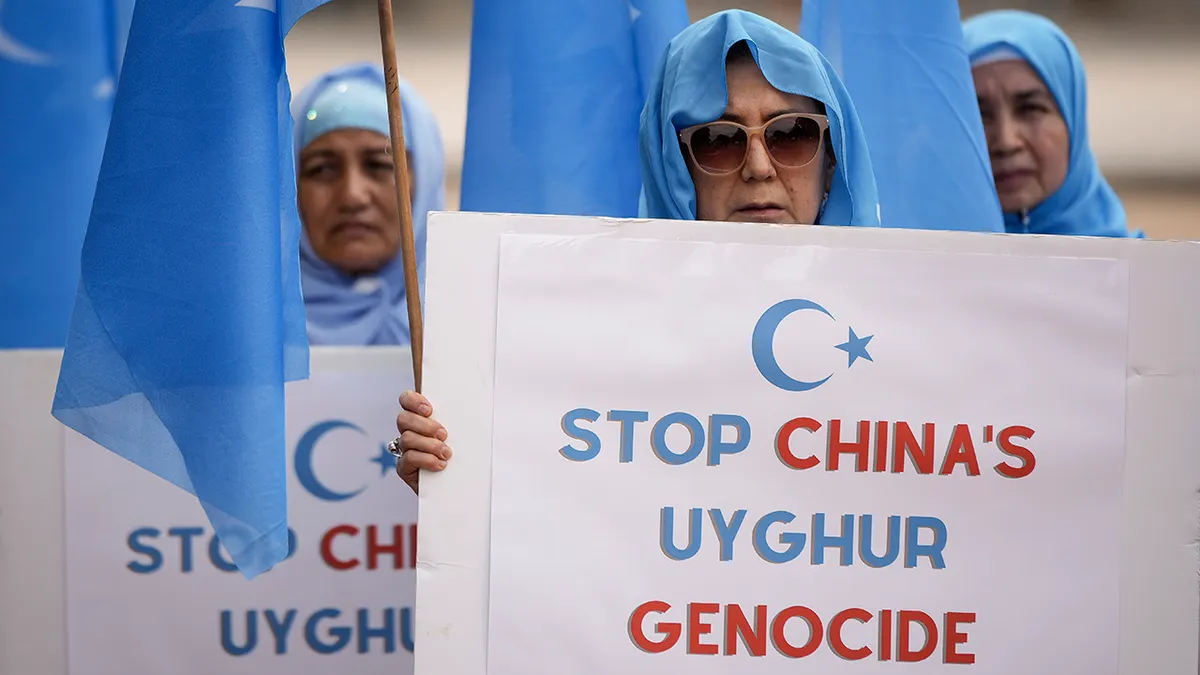 Supporters of East Turkistan National Awakening Movement rally in front of the White House in Washington, D.C.