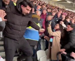 Šokantan trenutak Arsenalov navijač bačen je niz stepenice stadiona nakon što je naljutio navijače West Hama sjedeći na domaćem terenu