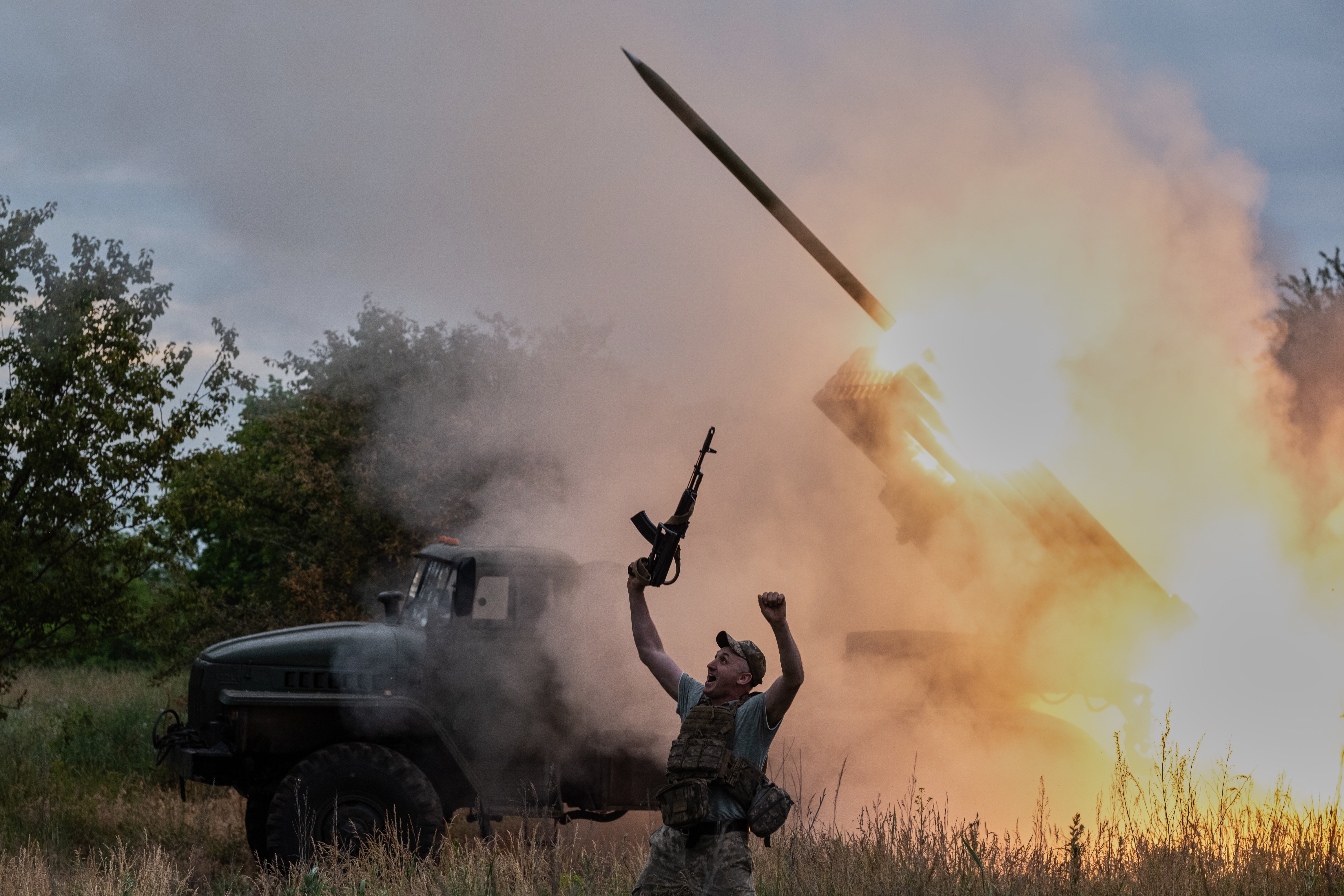 In this photo provided by Ukraine's 93rd Kholodnyi Yar Separate Mechanised Brigade press service, a soldier reacts as an MRLS BM-21 Grad fires at the Russian positions near Kostiantynivka, Donetsk region, Ukraine, Thursday, 4 June 2026