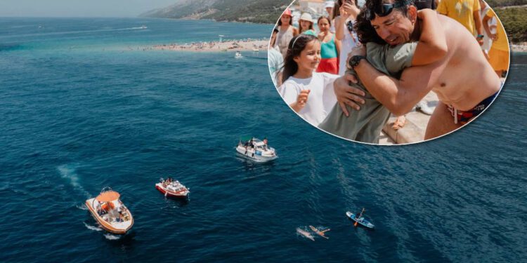 BRAČ DIŠE KAO JEDNO Emotivni doček na pola puta napunio baterije plivaču velikog srca