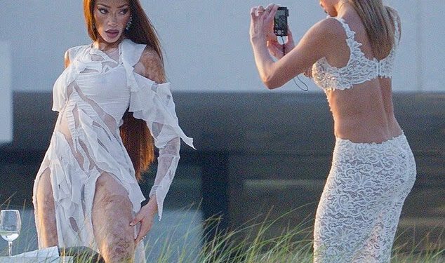 Winnie Harlow privlači pažnju dok pozira u bijeloj haljini s izrezima na zabavi punoj zvijezda u vili Michaela Rubina u Hamptonsu