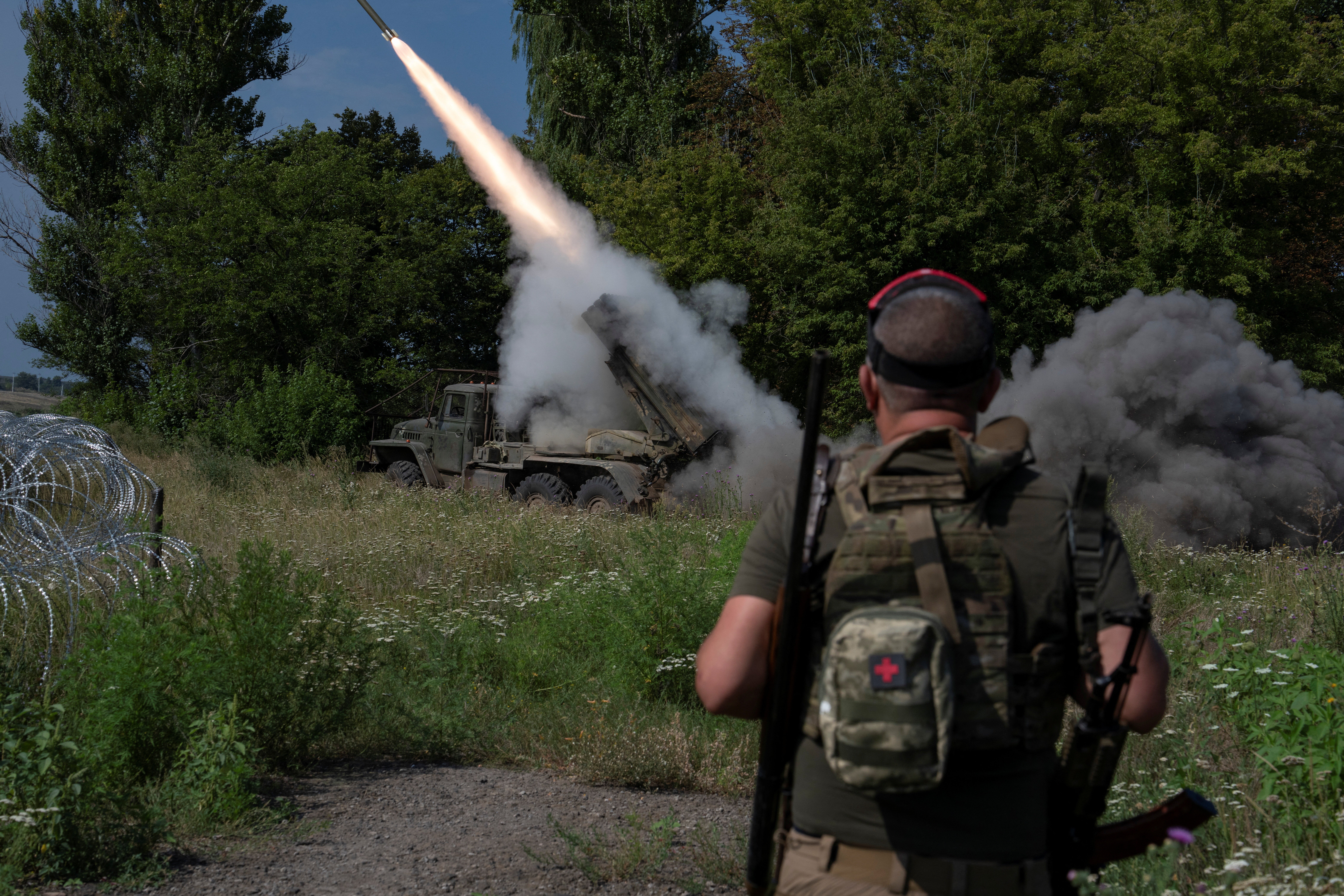 Servicemen of the 93rd Kholodnyi Yar Separate Mechanized Brigade of the Ukrainian Armed Forces fire a BM-21 Grad multiple launch rocket system towards Russian troops, amid Russia's attack on Ukraine, near the frontline city of Kramatorsk, Ukraine August 4, 2026
