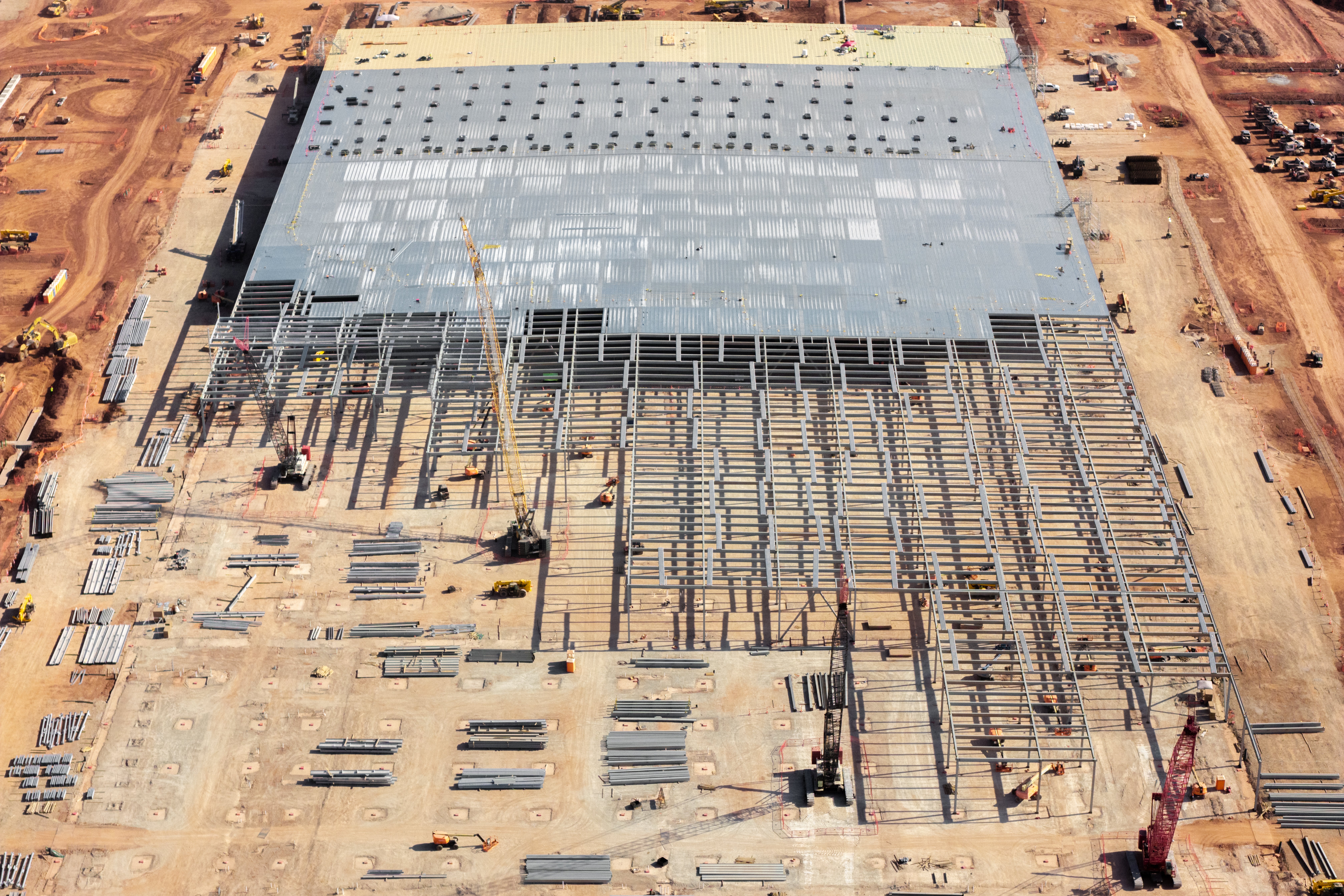 Construction continues on the Stargate Oracle AI data center in Abilene, Texas, which will serve OpenAI, part of the $560 billion data center buildout projected from top tech companies this year
