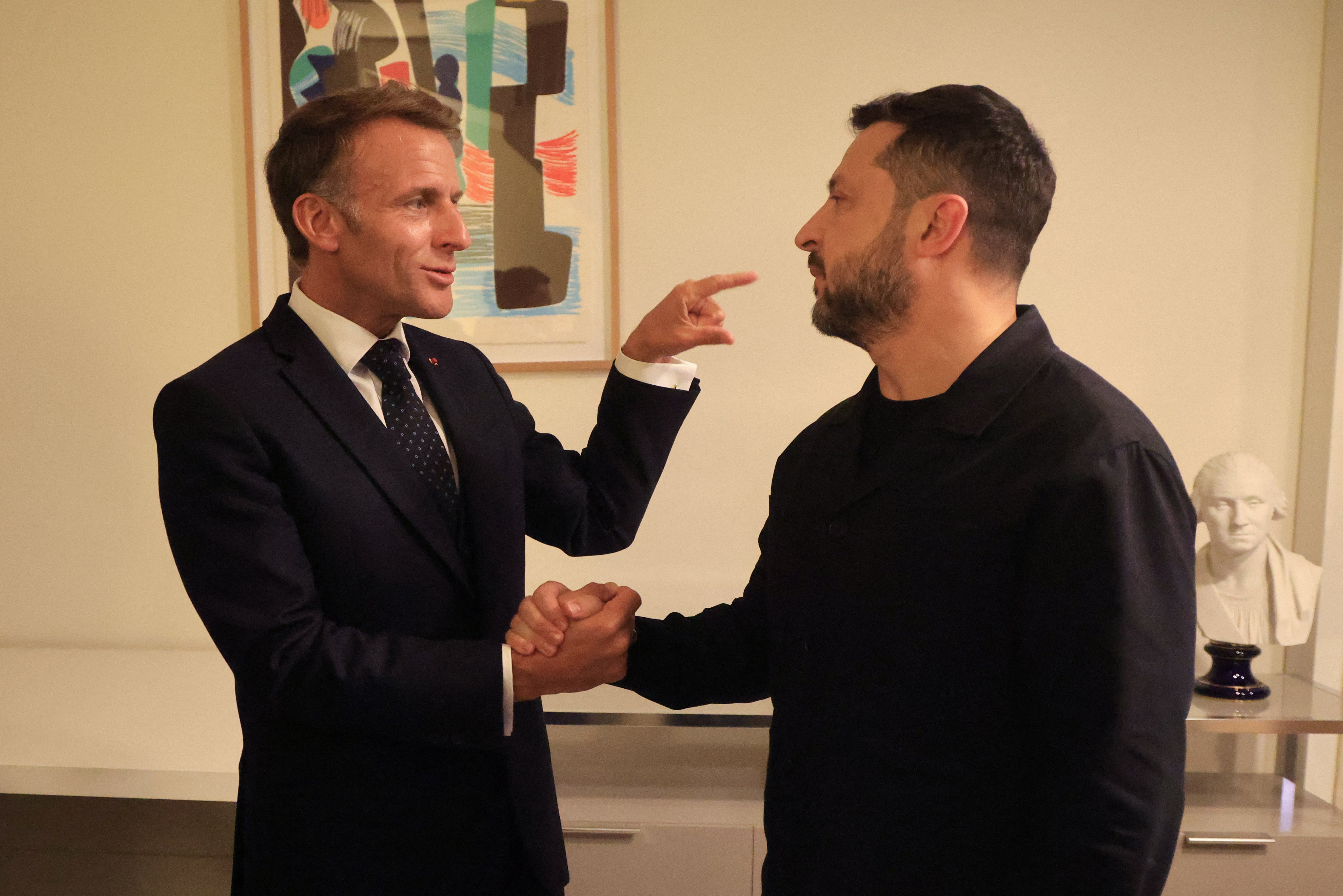 France's President Emmanuel Macron meets with Ukraine's President Volodymyr Zelensky (R) on the sidelines of the 81st United Nations General Assembly in New York City