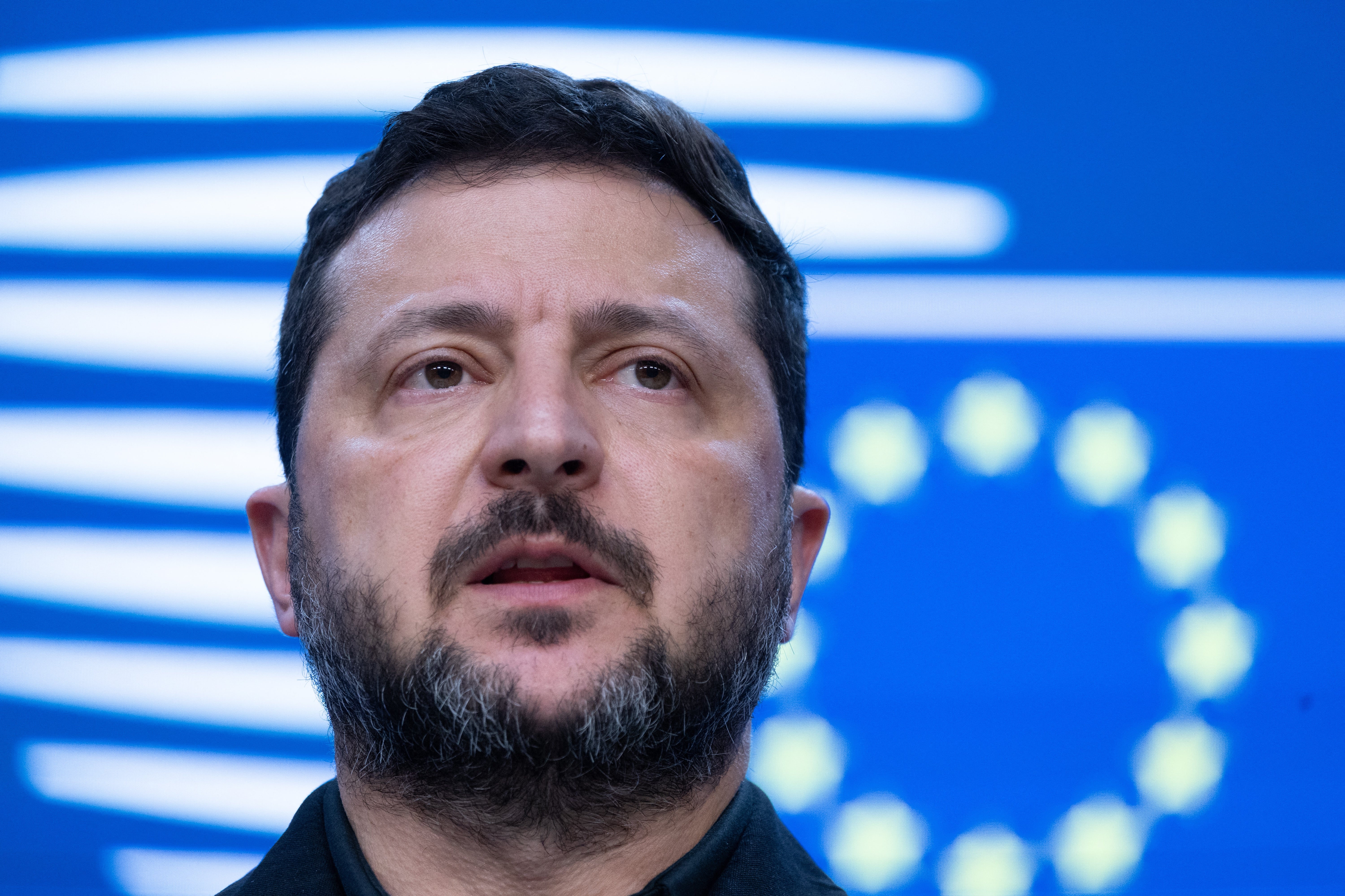 Ukraine's president Volodymyr Zelensky speaks during a press conference as part of a European Union summit at the EU headquarters in Brussels on 16 October 2026