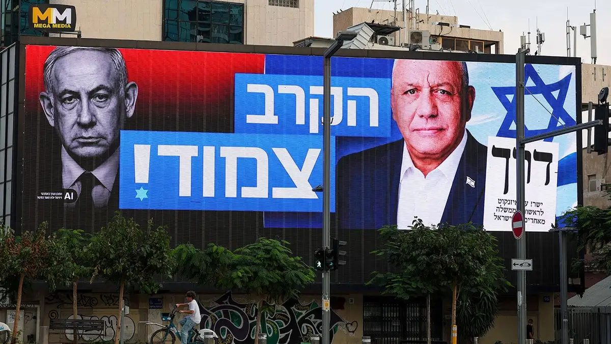 Posters of former Israeli Chief of General Staff and Yashar Party leader Gadi Eisenkot (right) and Prime Minister and Likud Party leader Benjamin Netanyahu (left)